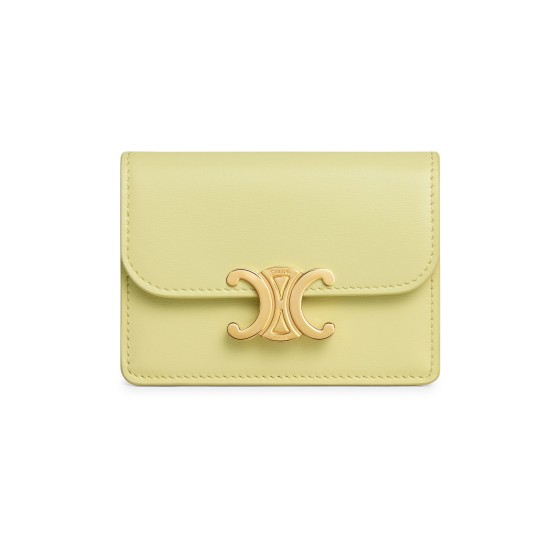 Card holder with flap Triomphe in shiny calfskin - Yellow